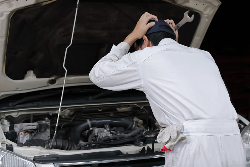 Frustrated car mechanic